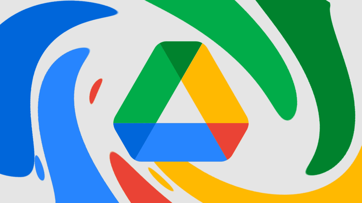 Logo do Google Drive, triângulo colorido em verde, amarelo, azul e vermelho sobre fundo cinza com faixas coloridas em movimento