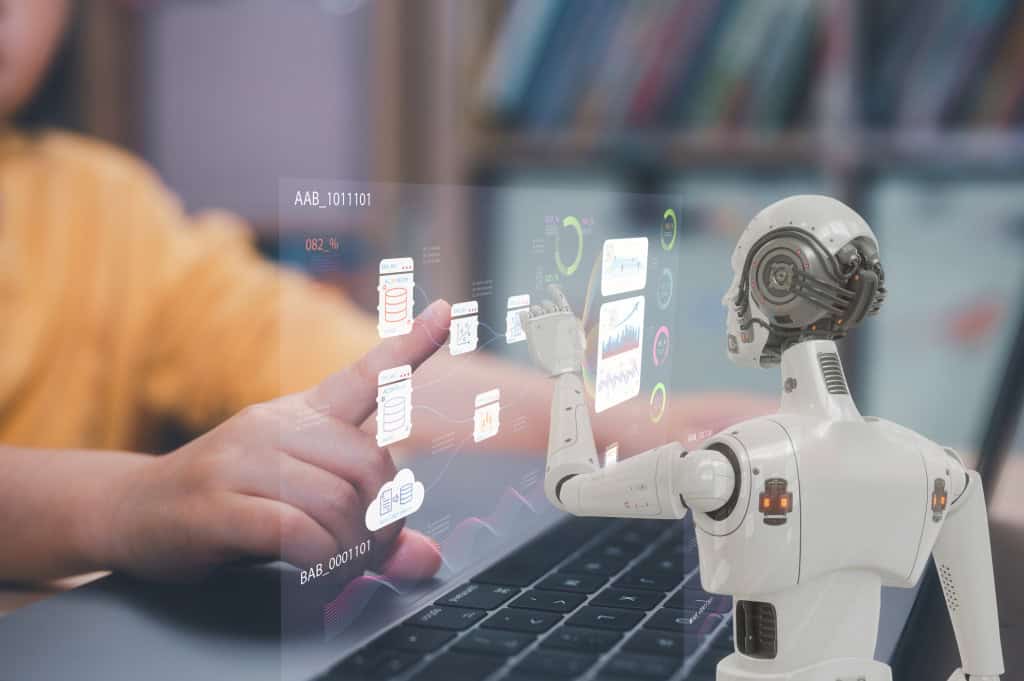 Uso de IA no Brasil supera EUA: 62% já adotaram a tecnologia 2 Mãos abertas segurando holografia azul com elementos digitais e circuito em formato de AI