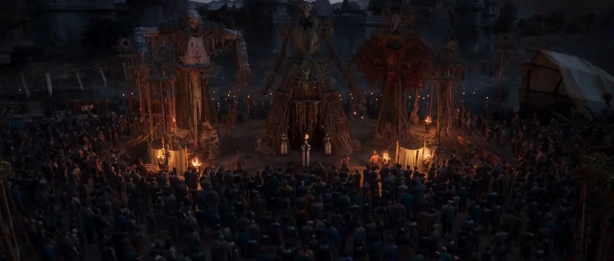 Larian Studios decide não usar mais IA generativa nas artes conceituais de Divinity 2 Praça cerimonial noturna com multidão e estruturas de madeira em Divinity