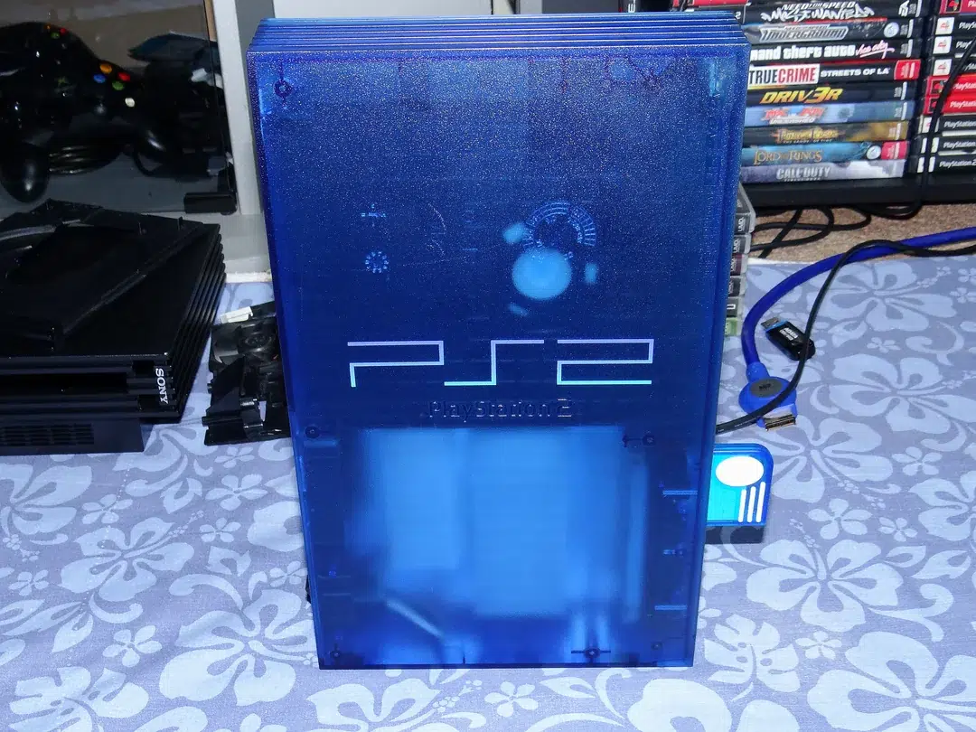 Gamer restaura uma das edições mais bonitas do PS2 e resultado recupera o visual translúcido dos anos 2000 3 restored ocean blue 39001 swapped v0 p5ygbefu1enh1