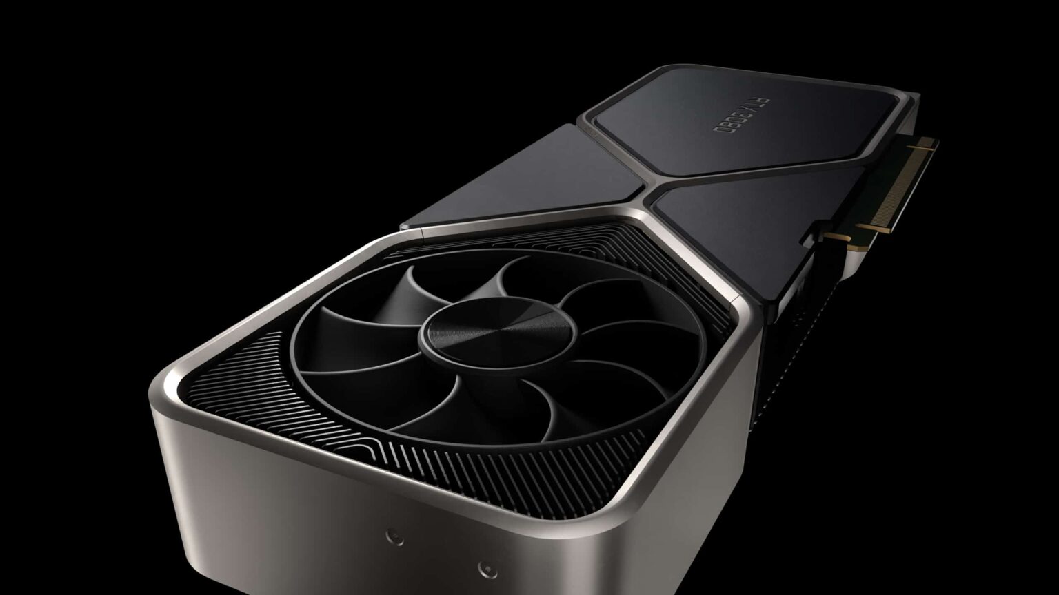 Placa de vídeo NVIDIA GeForce RTX 3080 de design prateado com ventoinha preta, vista em ângulo sobre fundo escuro