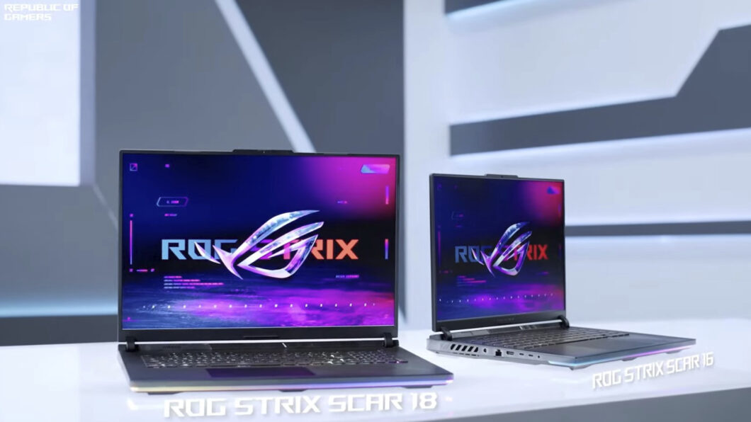 Dois notebooks gamer ROG Strix Scar 18 e Scar 16 da Asus lado a lado, com a logo ROG Strix nas telas e a marca Republic of Gamers no canto superior