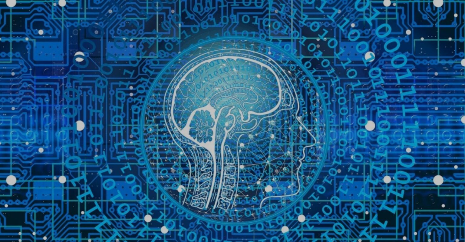 Ilustração em tons de azul de um perfil de cabeça humana com cérebro desenhado sobre um circuito eletrônico e sequências de números binários