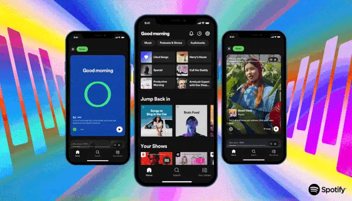 Três celulares com o app Spotify mostrando a tela inicial "Good morning", o feed de vídeos verticais com playlist "Good Vibes" e um fundo colorido com a logo d…
