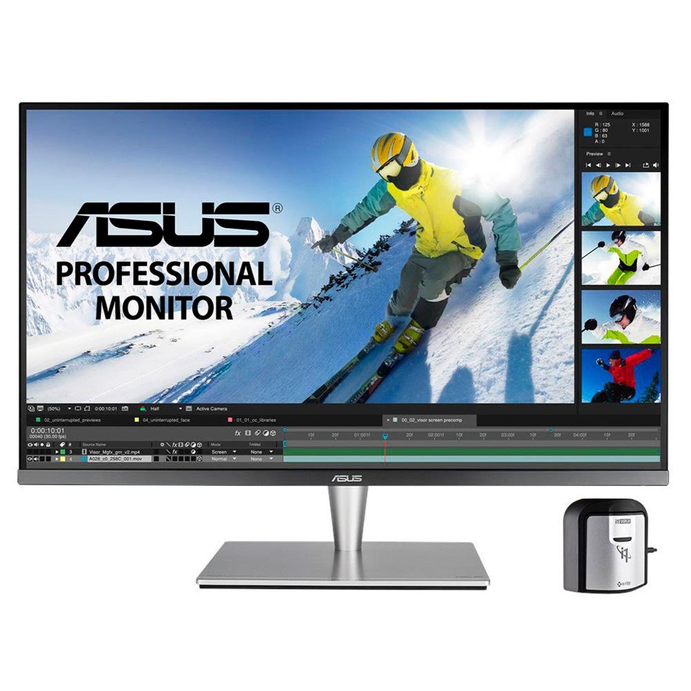 Monitor ASUS ProArt Professional exibindo um skatista/esquiador em alta velocidade na neve, com um acessório calibrador preto e prateado ao lado